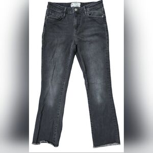 Free People faded black ankle boot cut raw hem mid rise jean, size 27